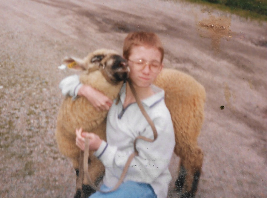 Abbie walking a dirt road